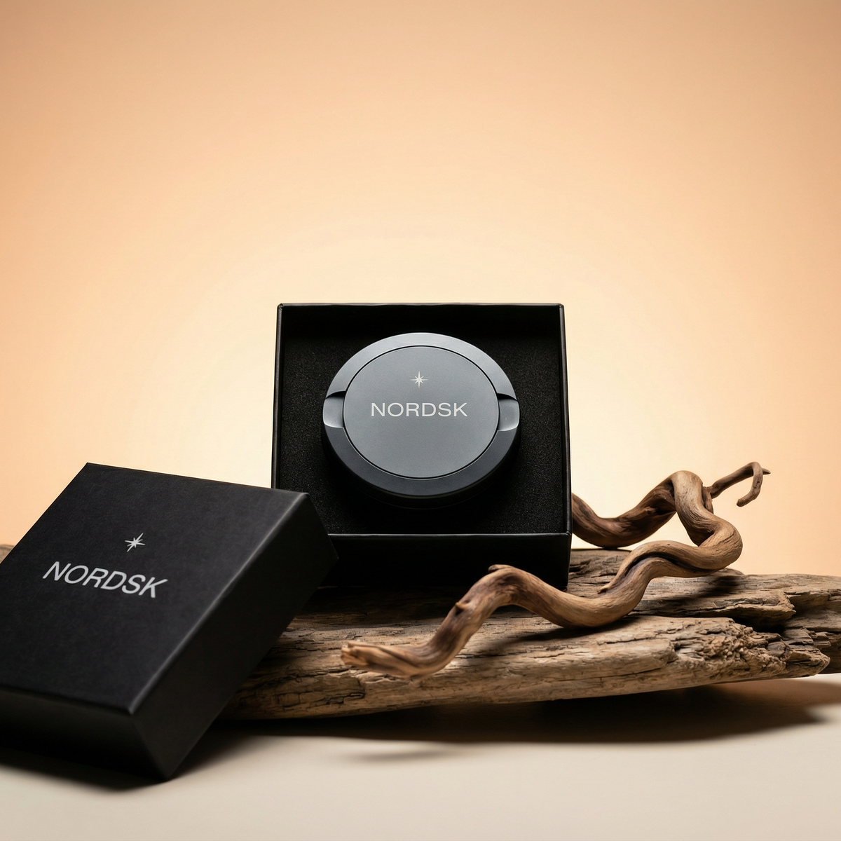 NORDSK snus tin in grey with gift box packaging and wooden display